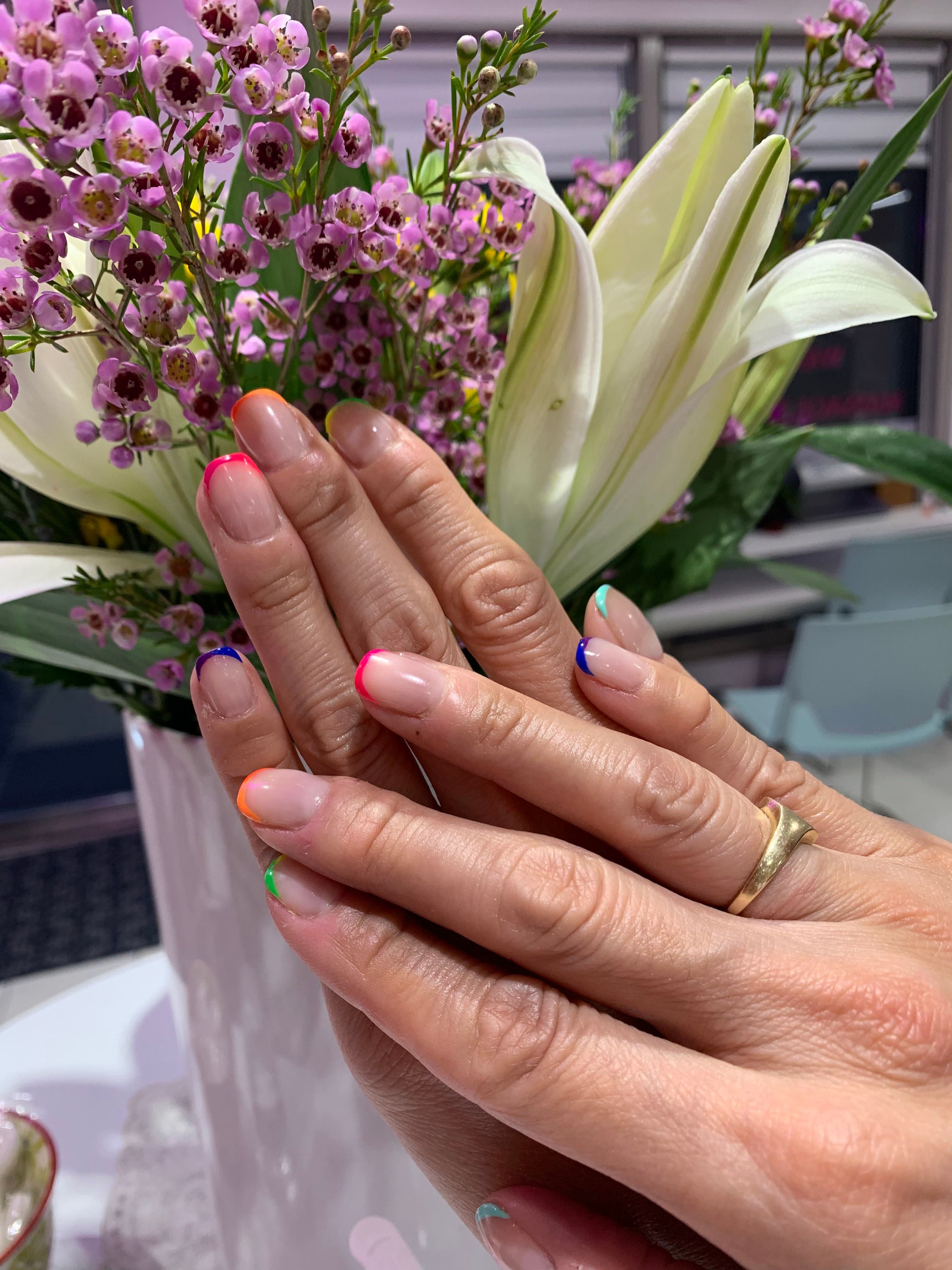 Neon rainbow French-tip nails