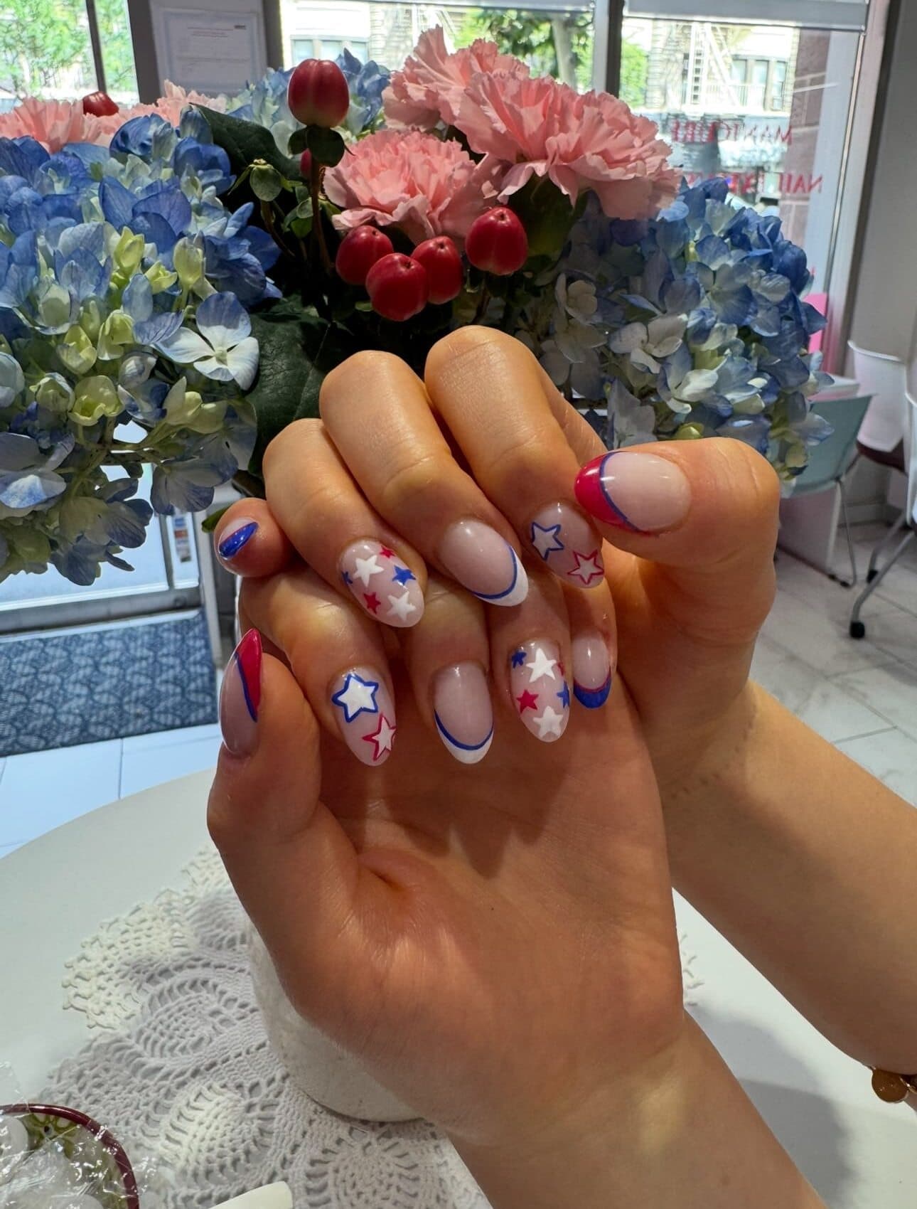 Red, white and blue star nail art