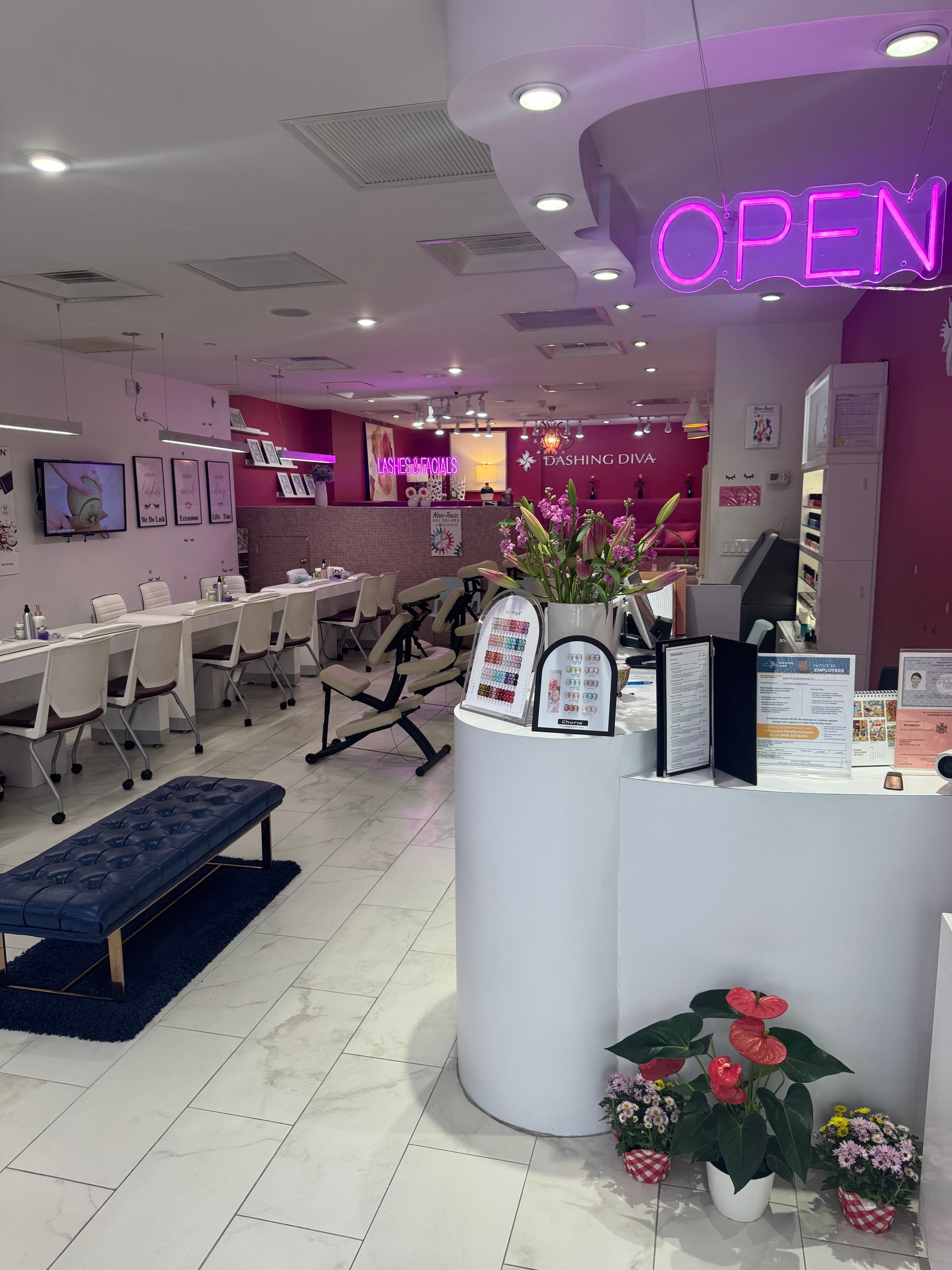 Dashing Diva salon interior with neon Open sign